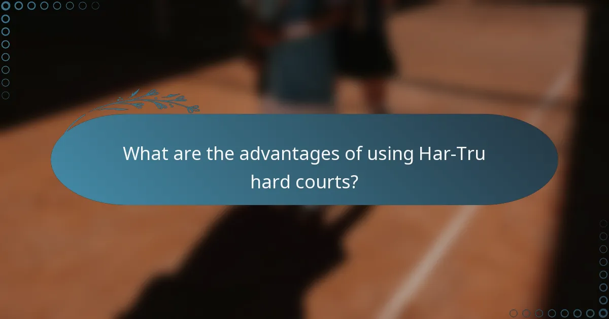 What are the advantages of using Har-Tru hard courts?